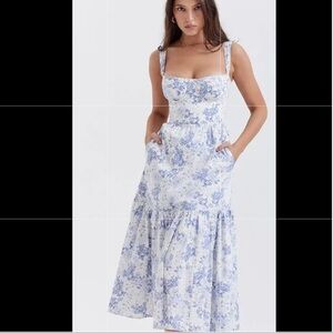 NWT Gorgeous white maxi dress with blue floral print, featuring a corset top.